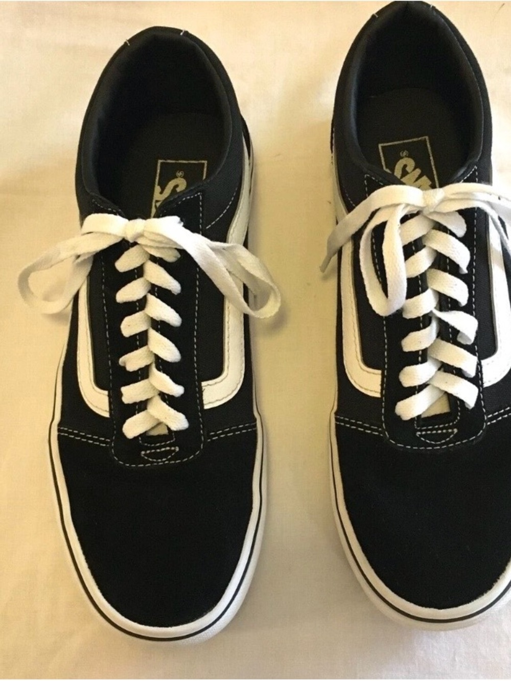 Vans women’s Black & White Low-Top Sneakers